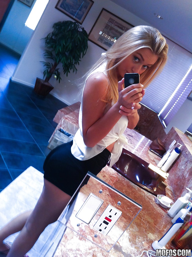 Alluring blonde babe Natalia Starr revealing her lovely curves