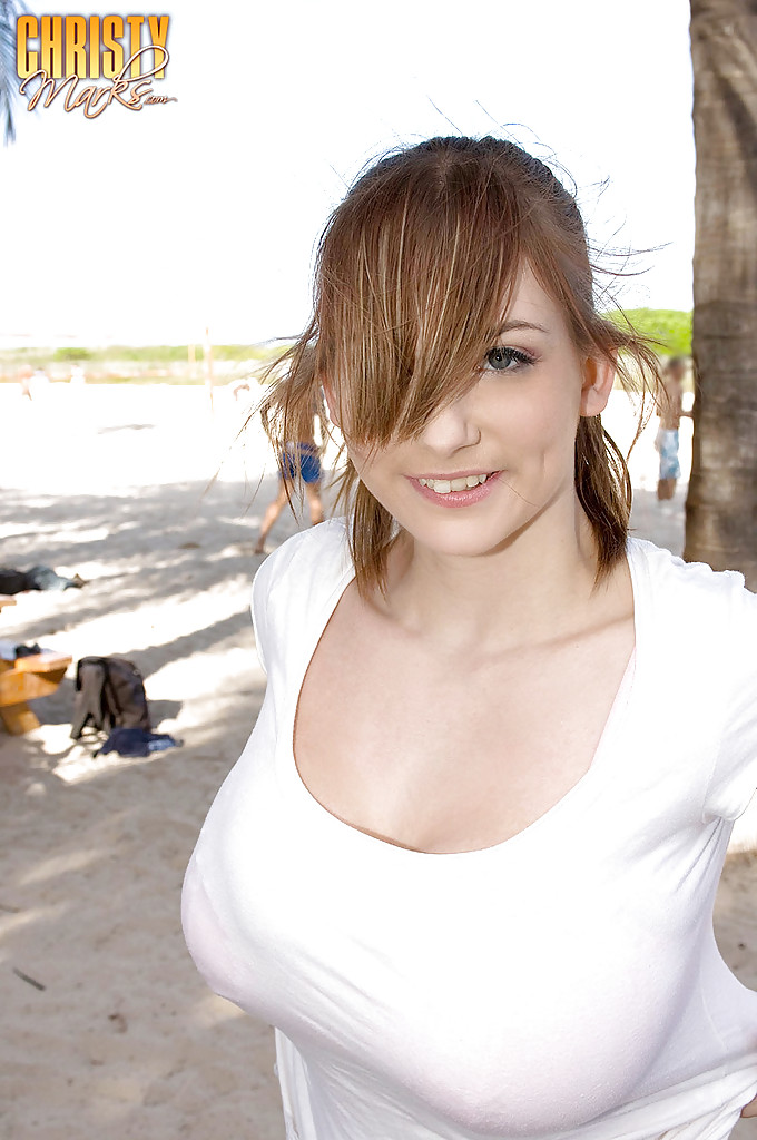 Busty redhead Christy Marks posing outdoor in jean miniskirt and white shirt #56242512
