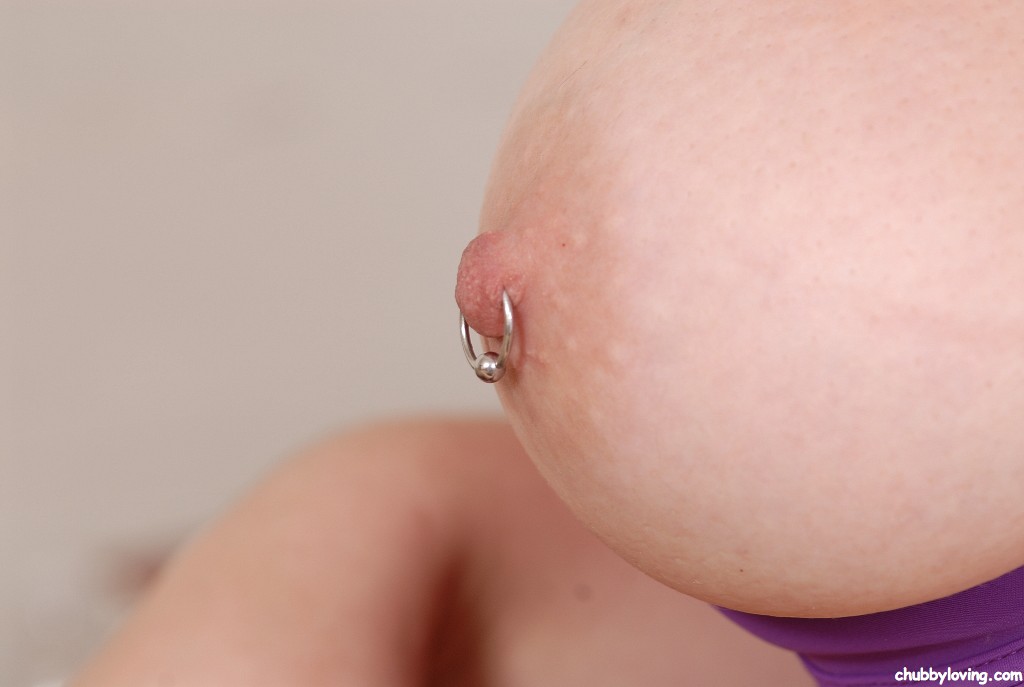 Sexy-looking girl with piercings in her nipples is masturbating #52322547