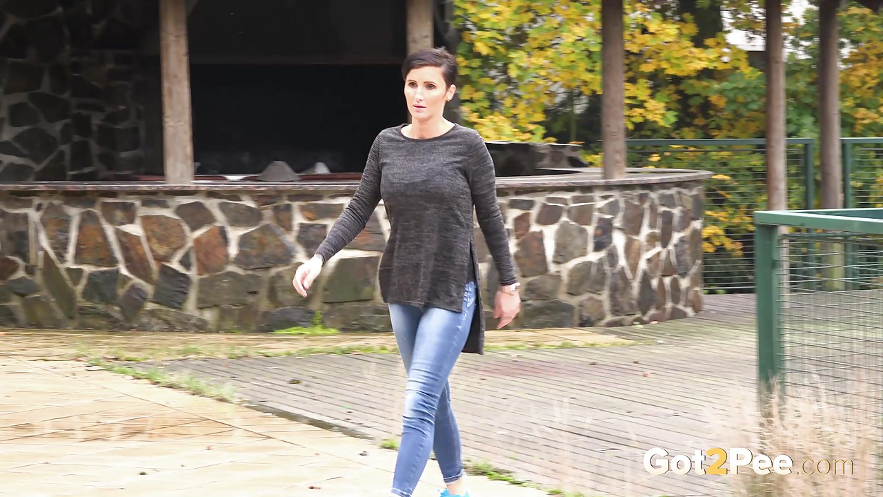 Busty Gabriellla Gucci in jeans undressing and pissing in public