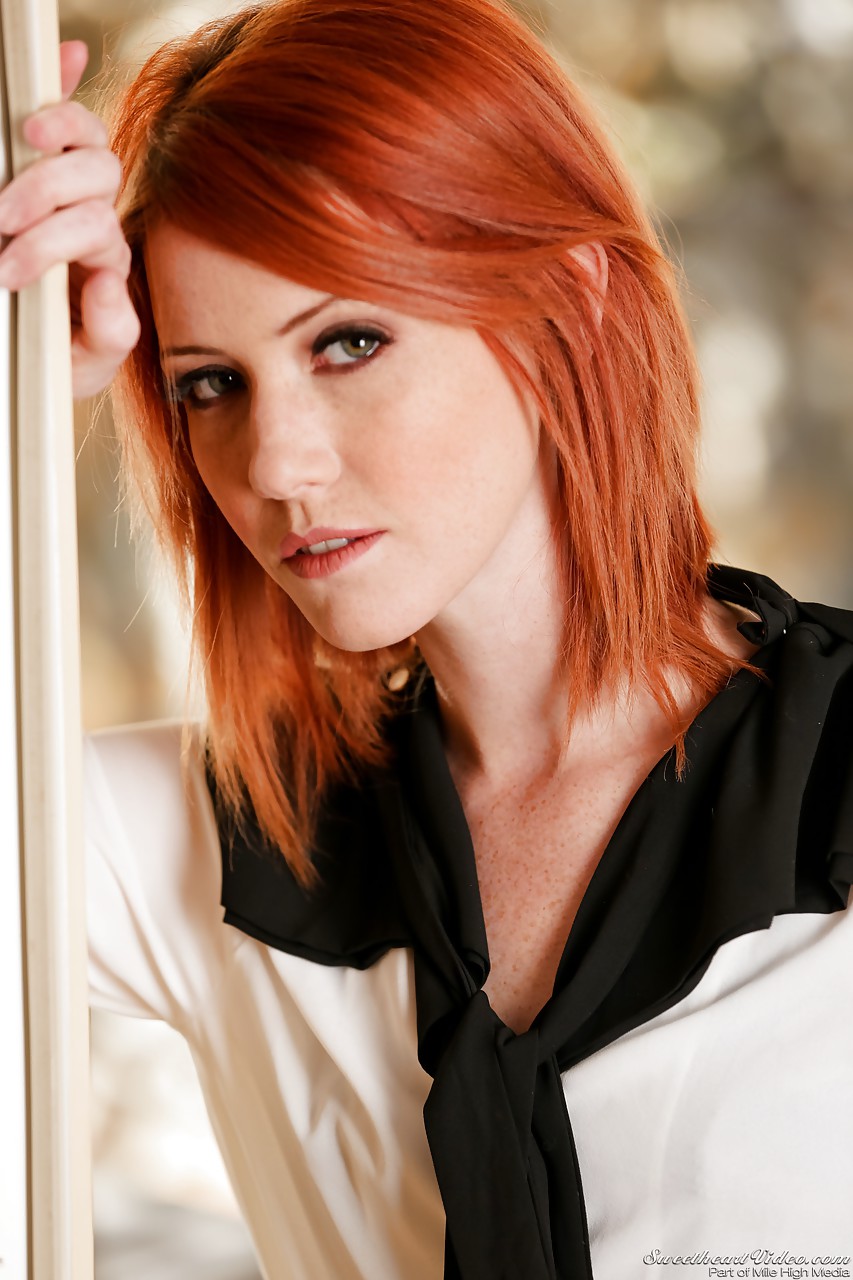 Gorgeous redhead stunner Elle Alexandra strips down sensually #51367882