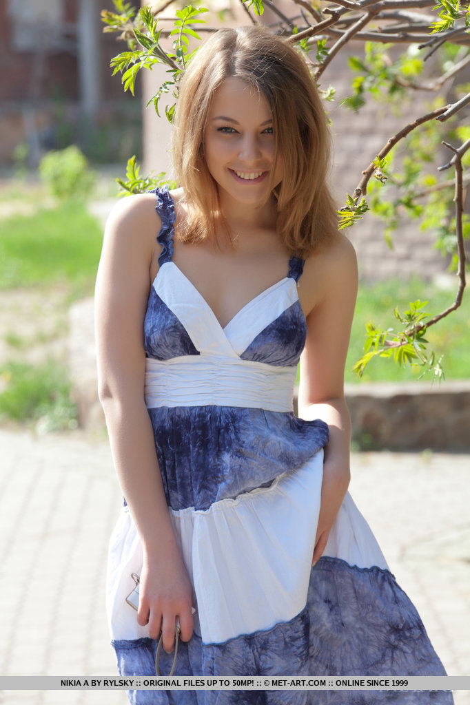 Smiley faced teen Nikia A removing dress for outdoor glamour spread #50613451