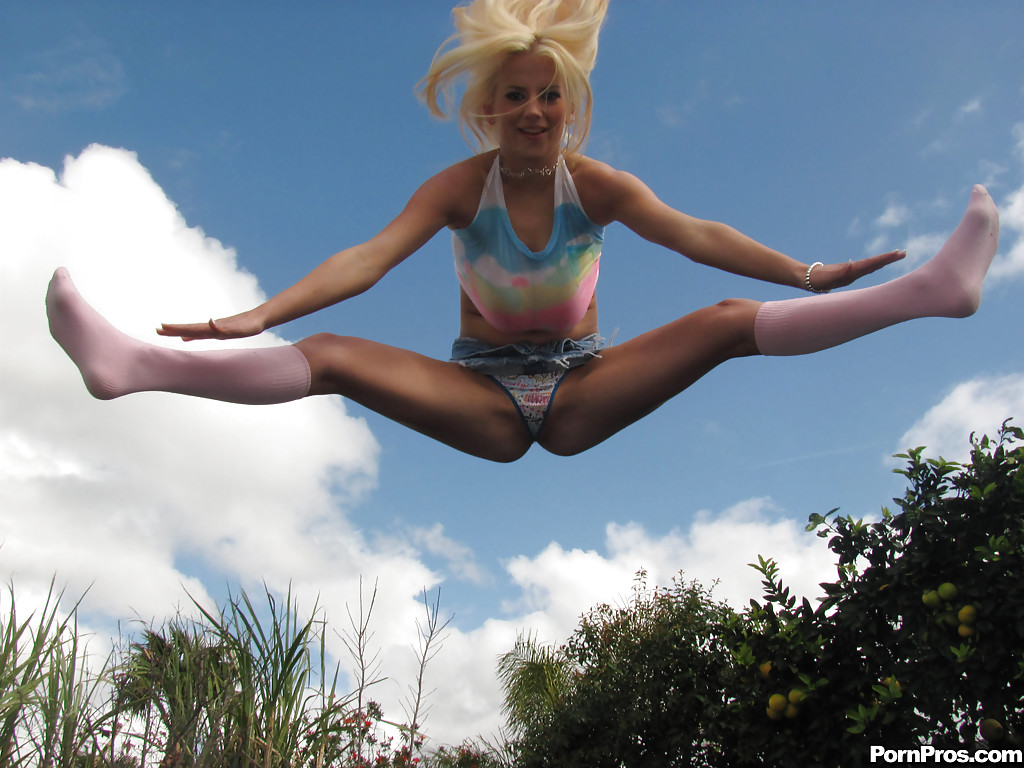 18 year old blonde Halie Cummings baring big boobs on trampoline outdoors #52030440