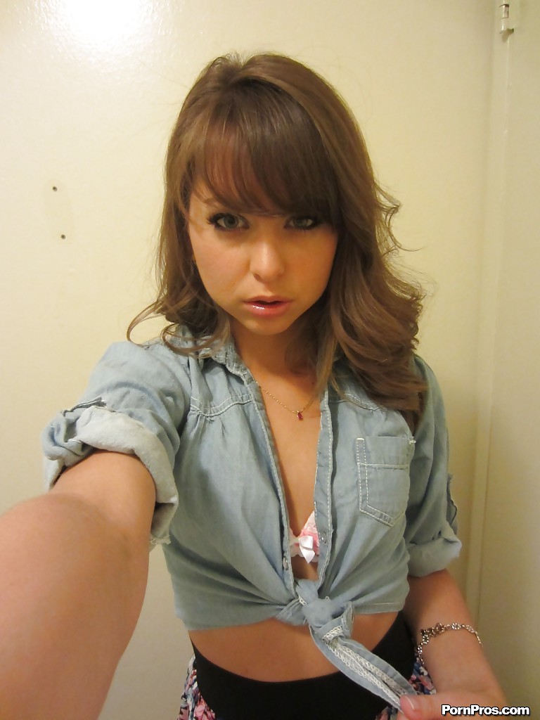 Clothed teen Riley Reid does some sexy self shots while in a toilet #51809240