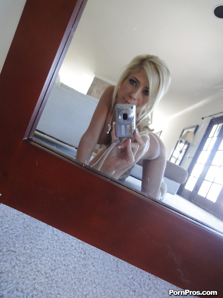 Blonde female Tasha Reign taking mirror self shots while removing her clothes #50966687