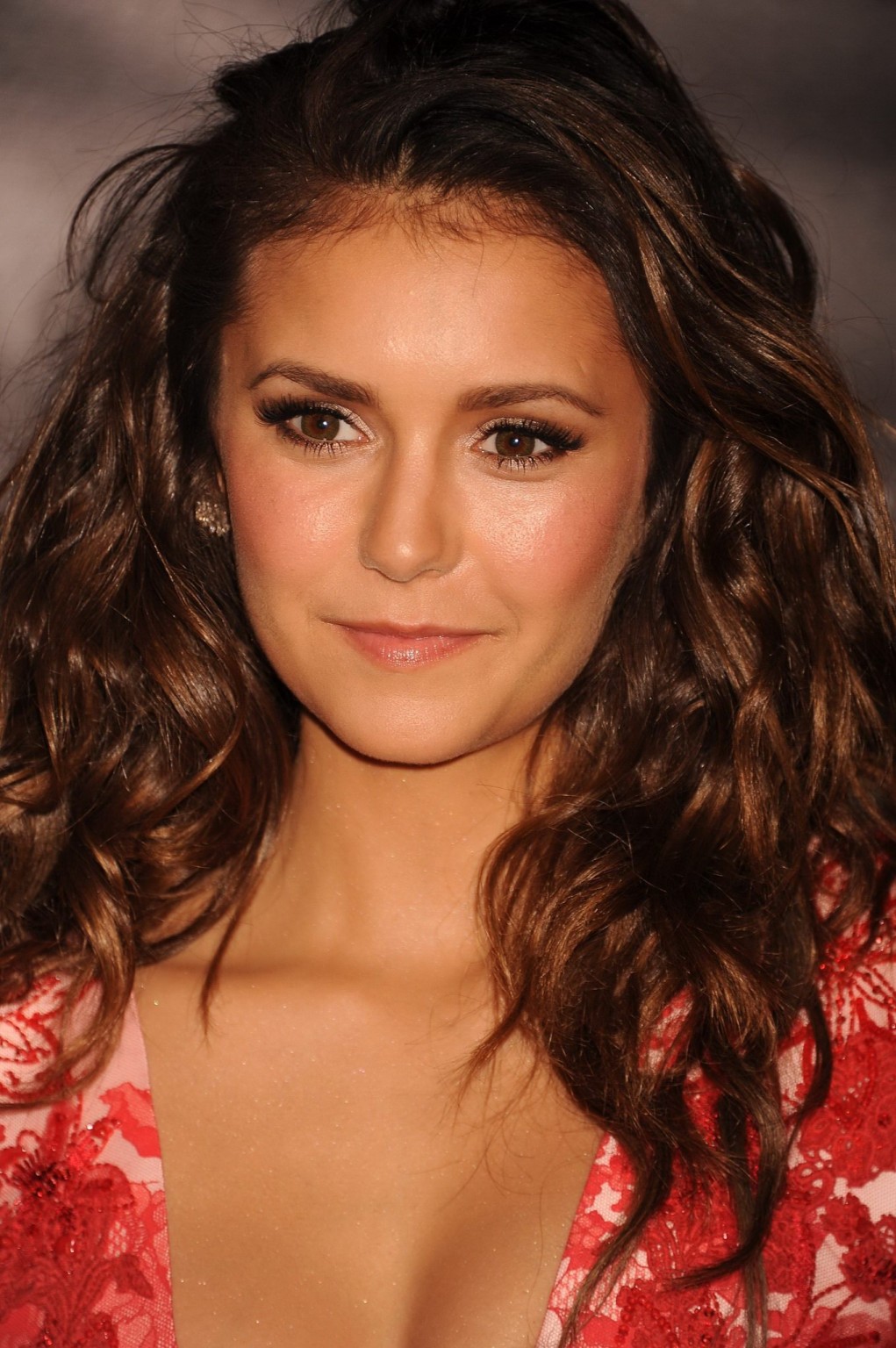Nina Dobrev braless showing huge cleavage in floral mini dress a #75161233