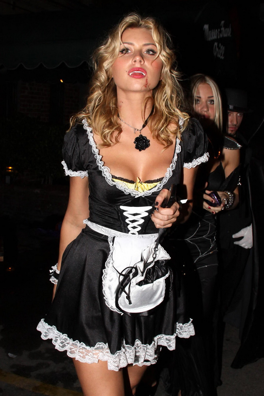 Dracula's French maid Alyson Michalka leaving The Pandora Halloween Party in Hol #75328144