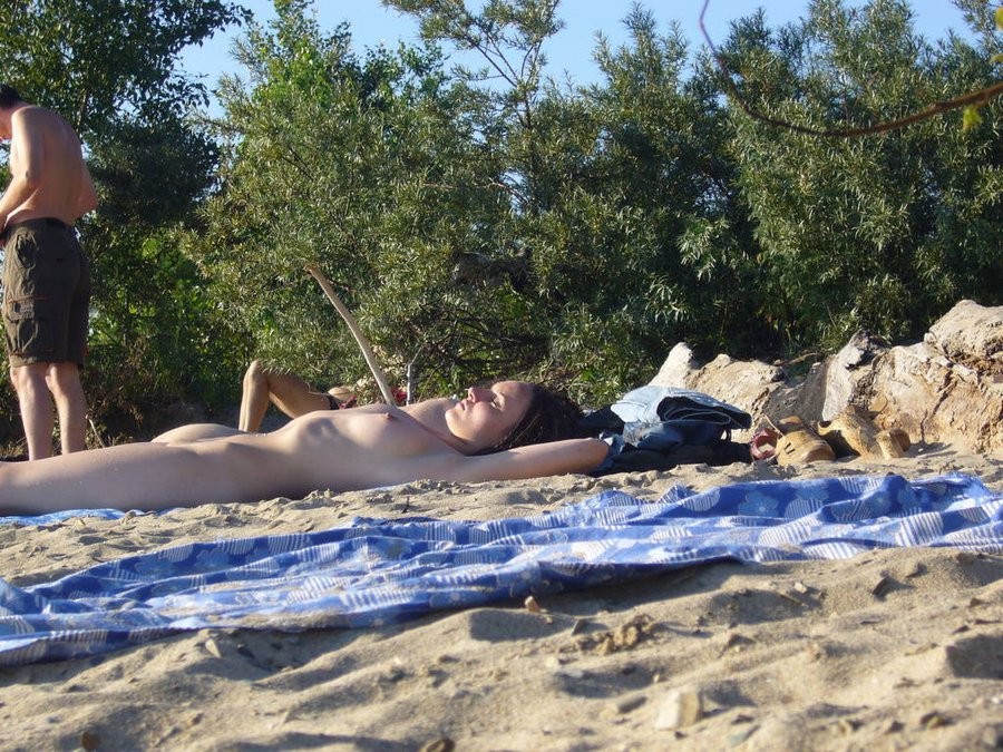 Brunette nudist loves feeling the sun on her body #72256553