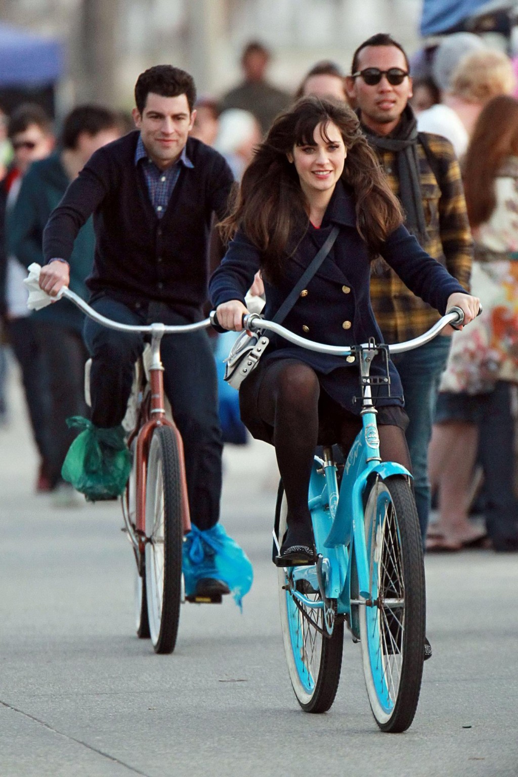 Zooey Deschanel upskirt while cycling in mini skirt  pantyhose on the 'New Girl' #75278285