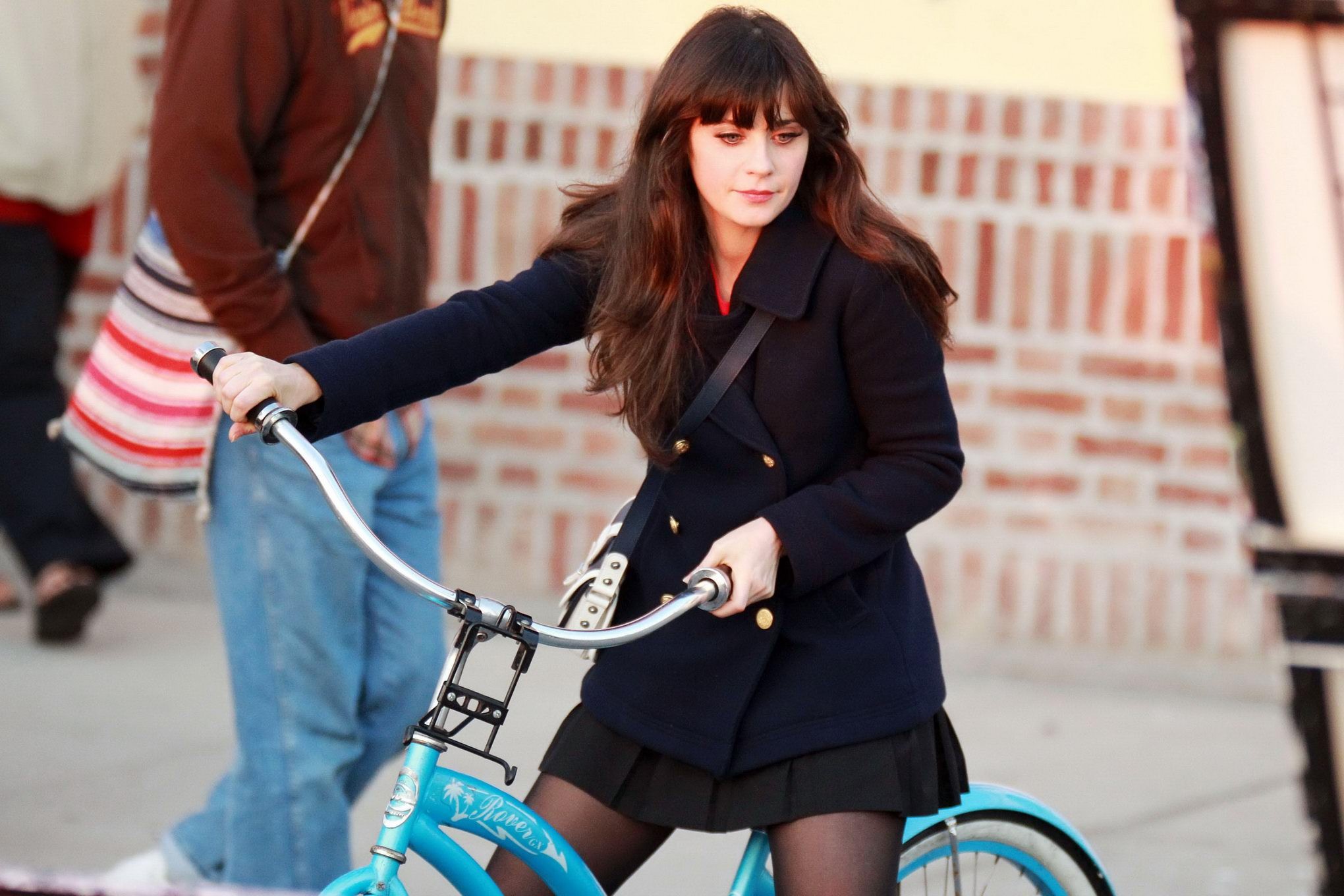 Zooey Deschanel upskirt while cycling in mini skirt  pantyhose on the 'New Girl' #75278314