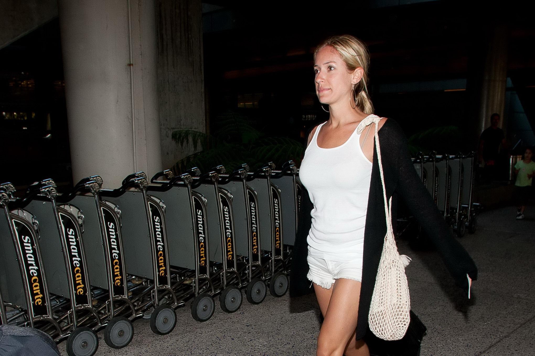 Kristin Cavallari leggy wearing white shorts at LAX Airport #75306697
