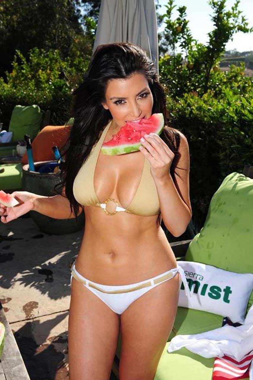 Kim Kardashian exposing sexy body and hot ass in bikini on beach #75305603