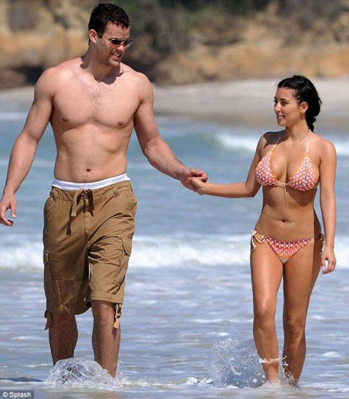 Kim Kardashian exposing sexy body and hot ass in bikini on beach #75305607