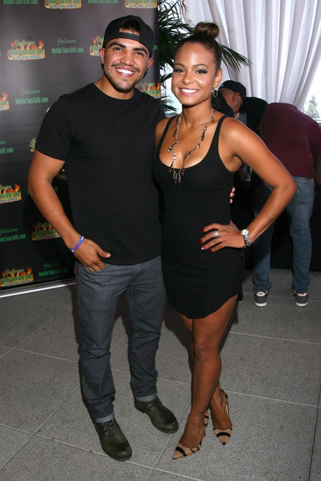 Christina Milian cleavy wearing a little black dress at GBK Luxury Sports Lounge #75190529