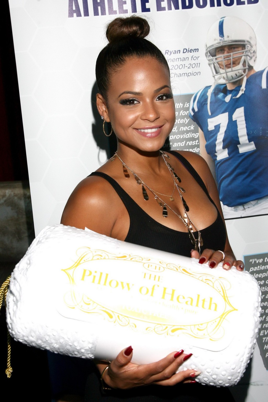 Christina Milian cleavy wearing a little black dress at GBK Luxury Sports Lounge #75190540