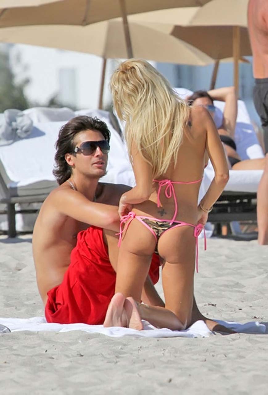 Shauna Sand showing her great ass in thong bikini on beach paparazzi pictures #75316203