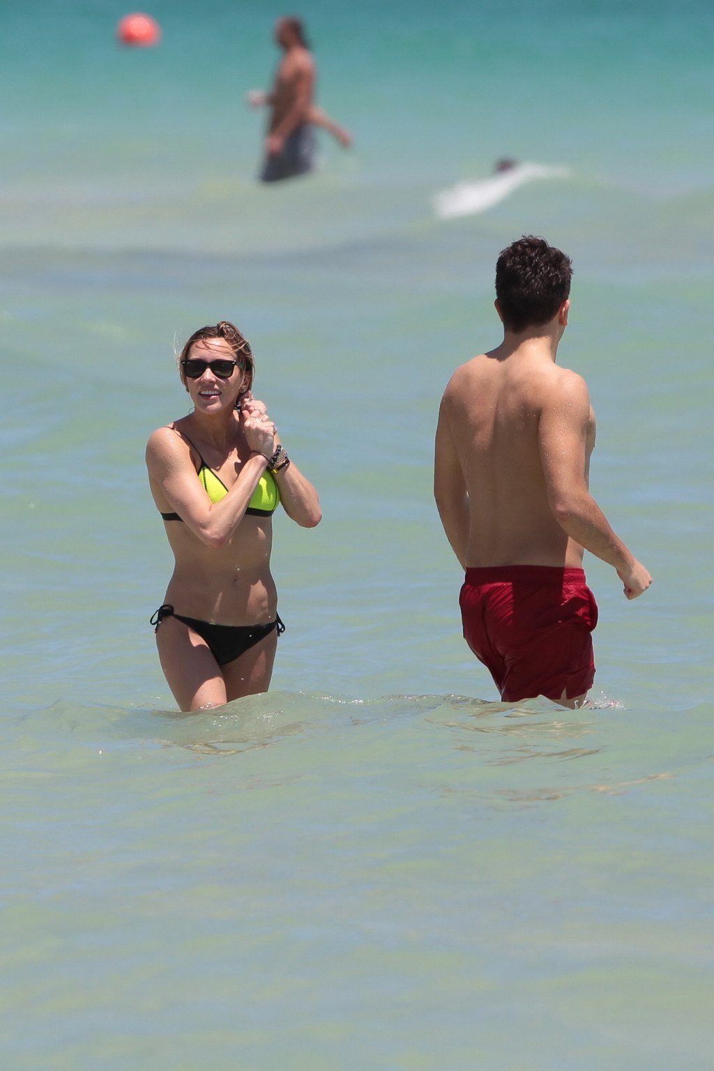 Katie Cassidy showing off her hot body in a tiny black and yellow bikini at the  #75166744