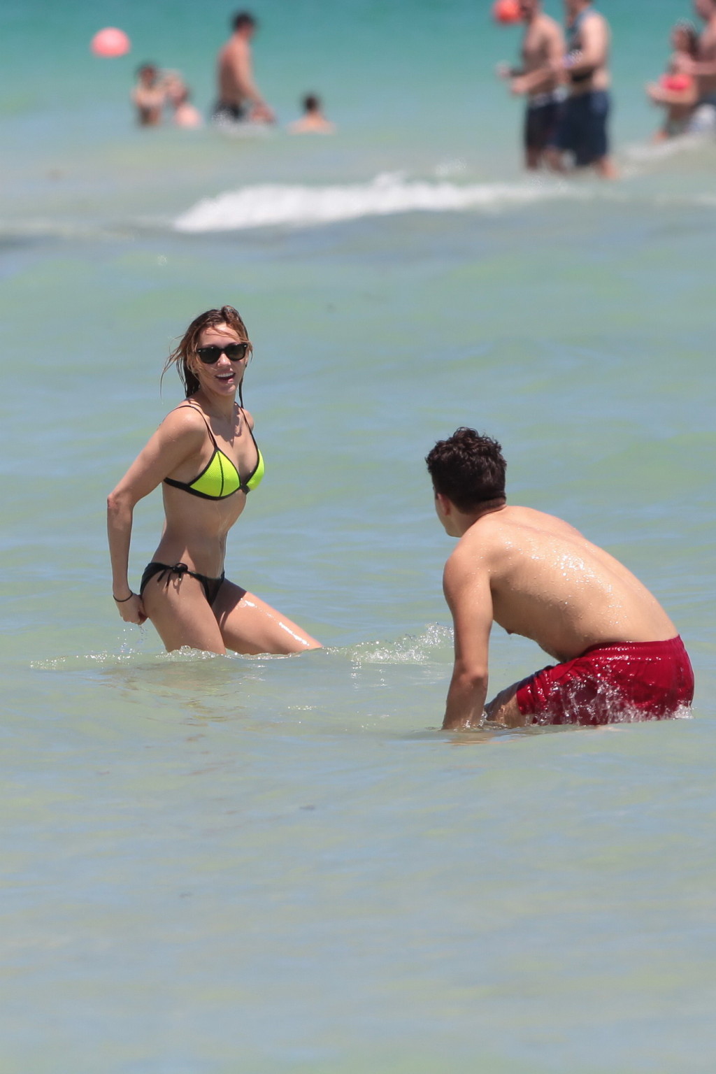 Katie Cassidy showing off her hot body in a tiny black and yellow bikini at the  #75166779