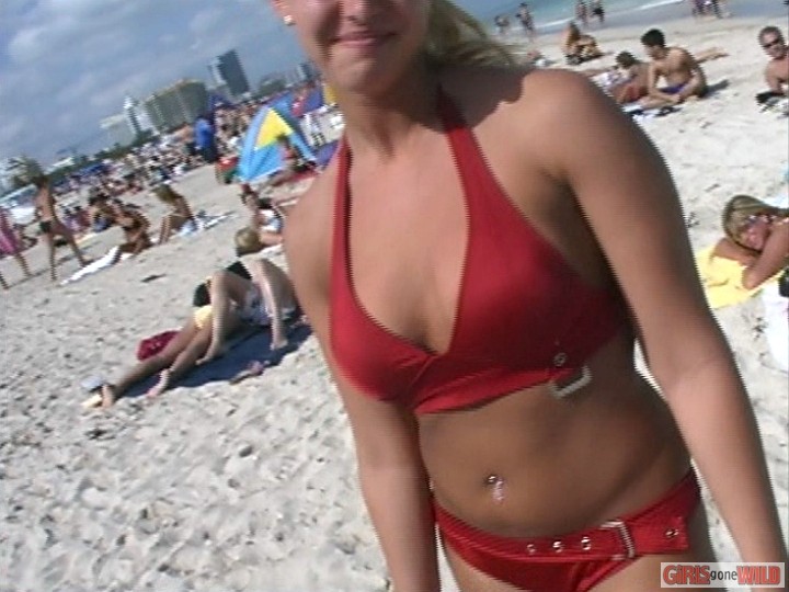Blonde in a red bikini flashes her big titties #72321046