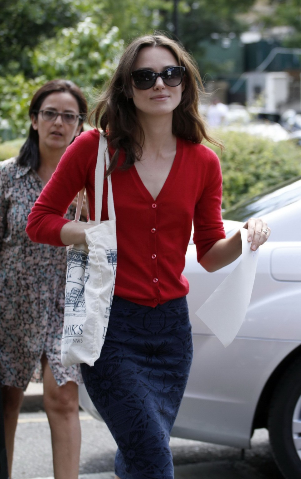 Keira Knightley showing hard pokies braless in red top and skirt out in London #75194187