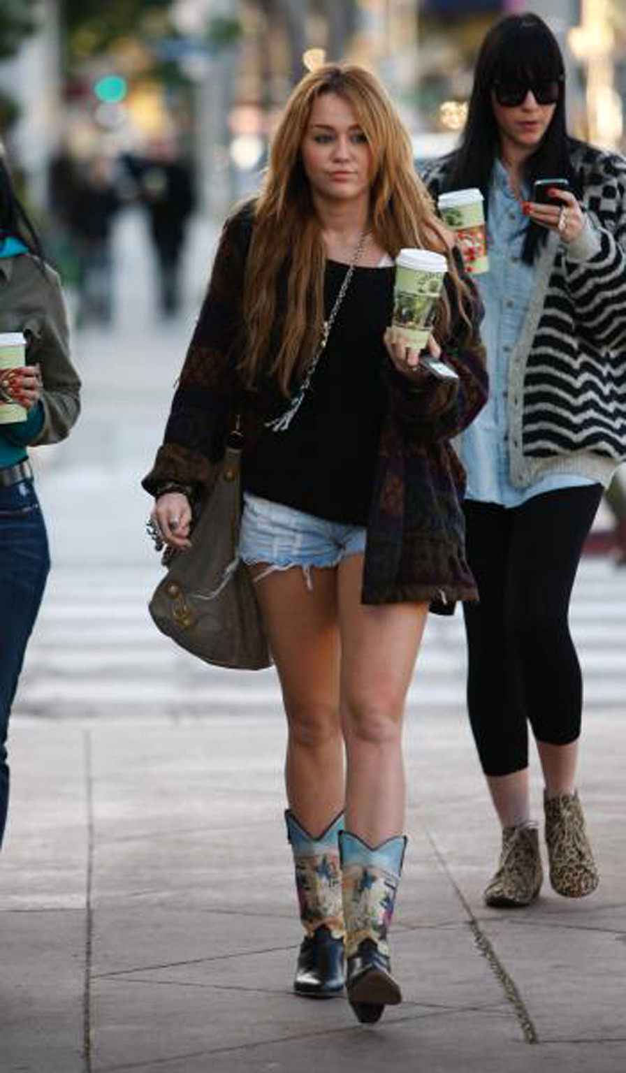 Miley Cyrus exposing sexy legs on street new paparazzi photos #75322053