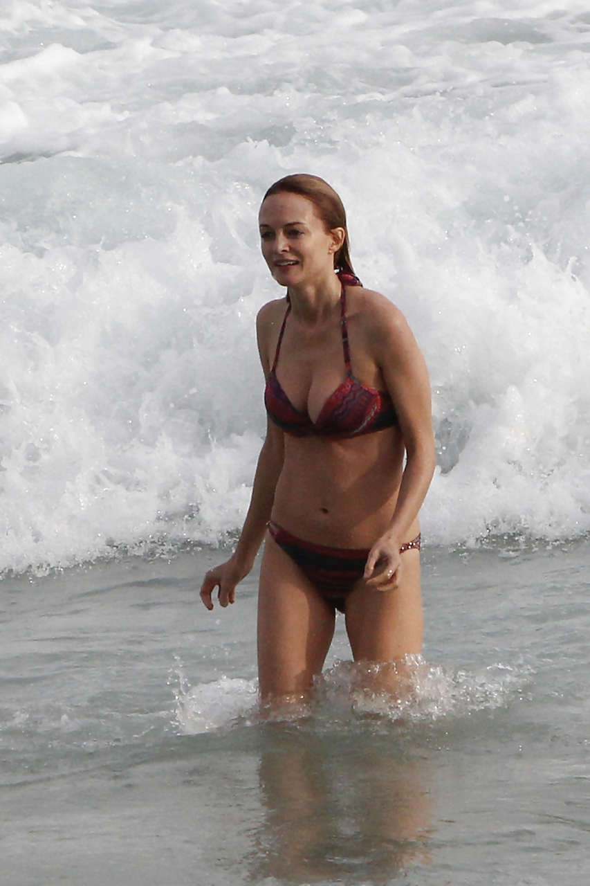 Heather Graham shows her sexy body in a bikini on the beach #75230804