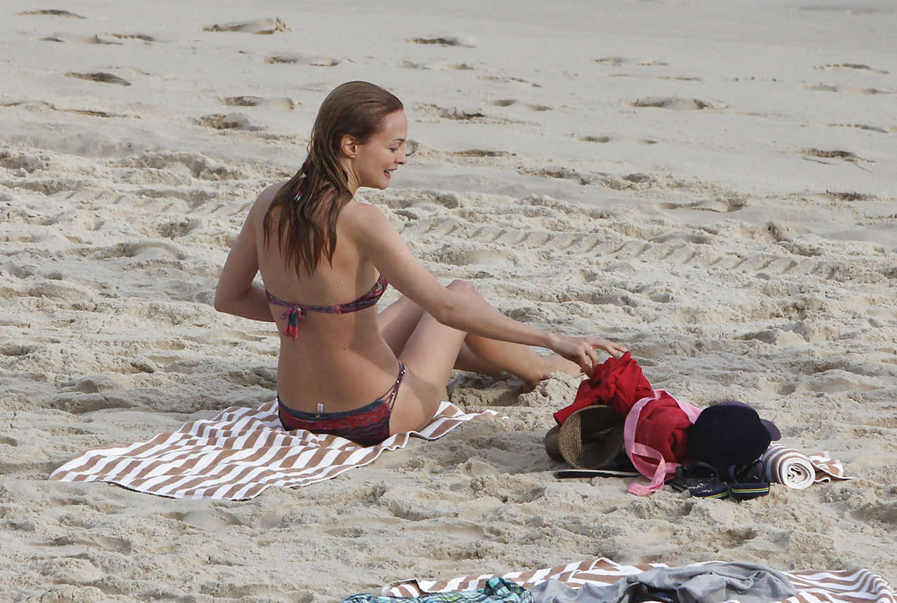 Heather Graham shows her sexy body in a bikini on the beach #75230831