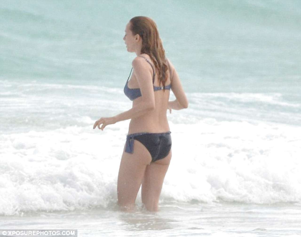 Heather Graham shows her sexy body in a bikini on the beach #75230883