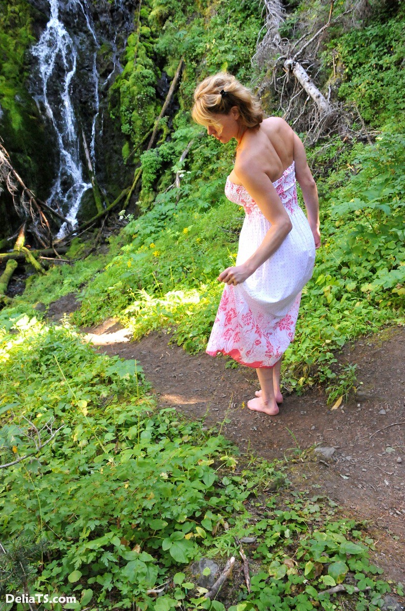 Pretty Delia by waterfall erect under her dress #67311951