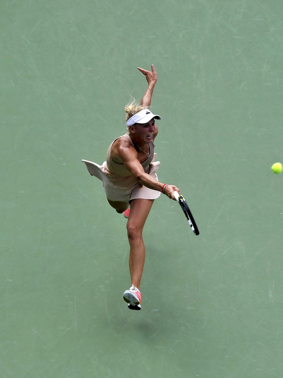 Caroline Wozniacki exhibe sa culotte jaune à l'Open de tennis des États-Unis. 
 #75186791