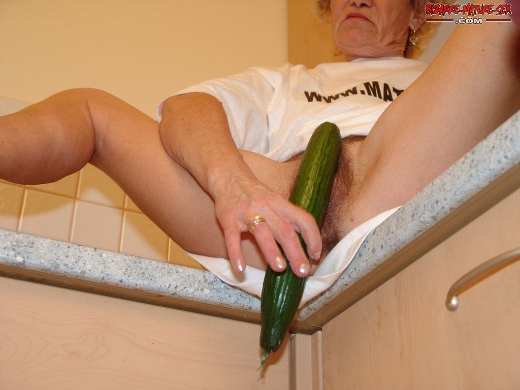 Stuffing vegetables in her cunt #76151845
