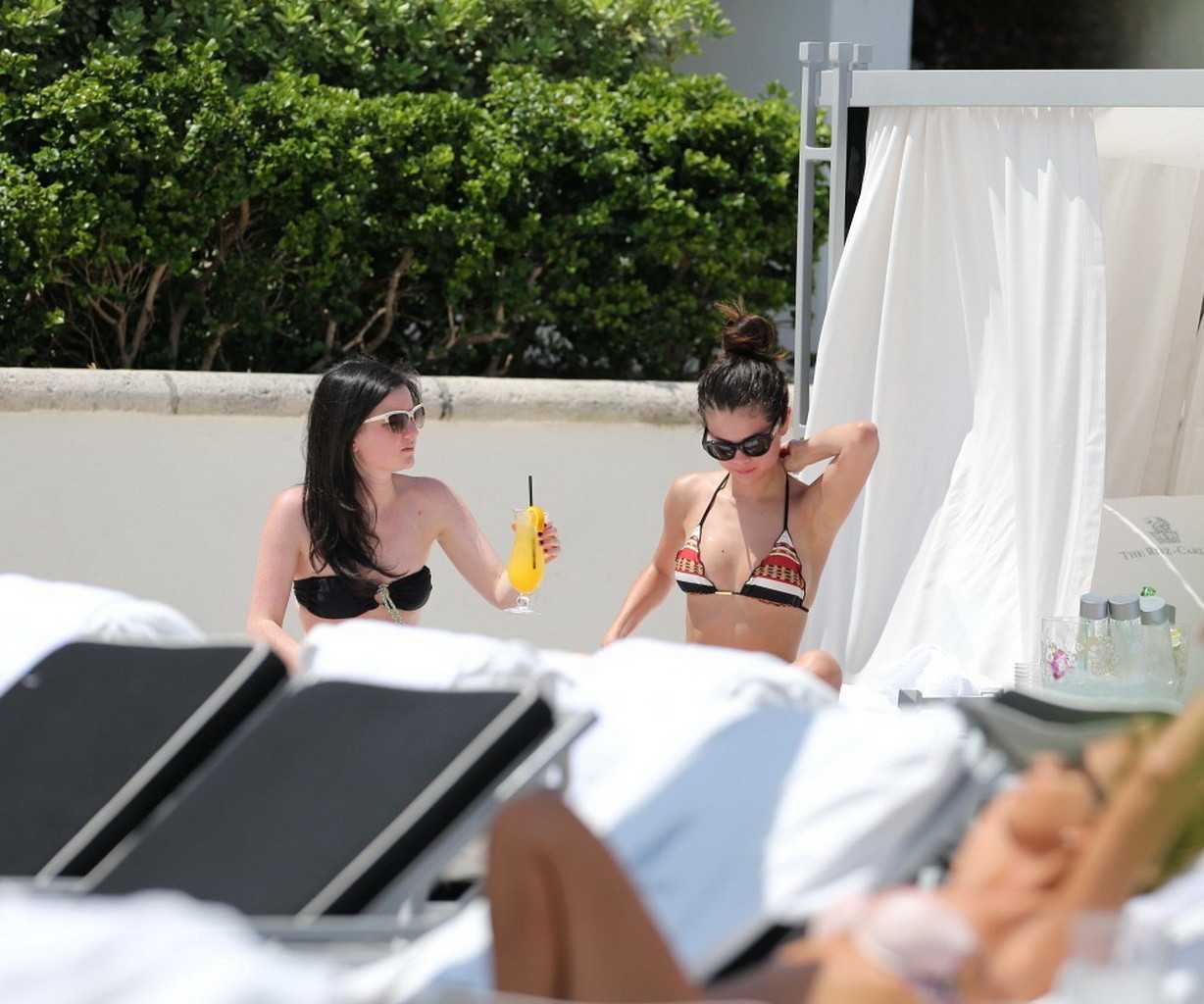 Selena Gomez showing off her bikini body poolside in Miami #75232843