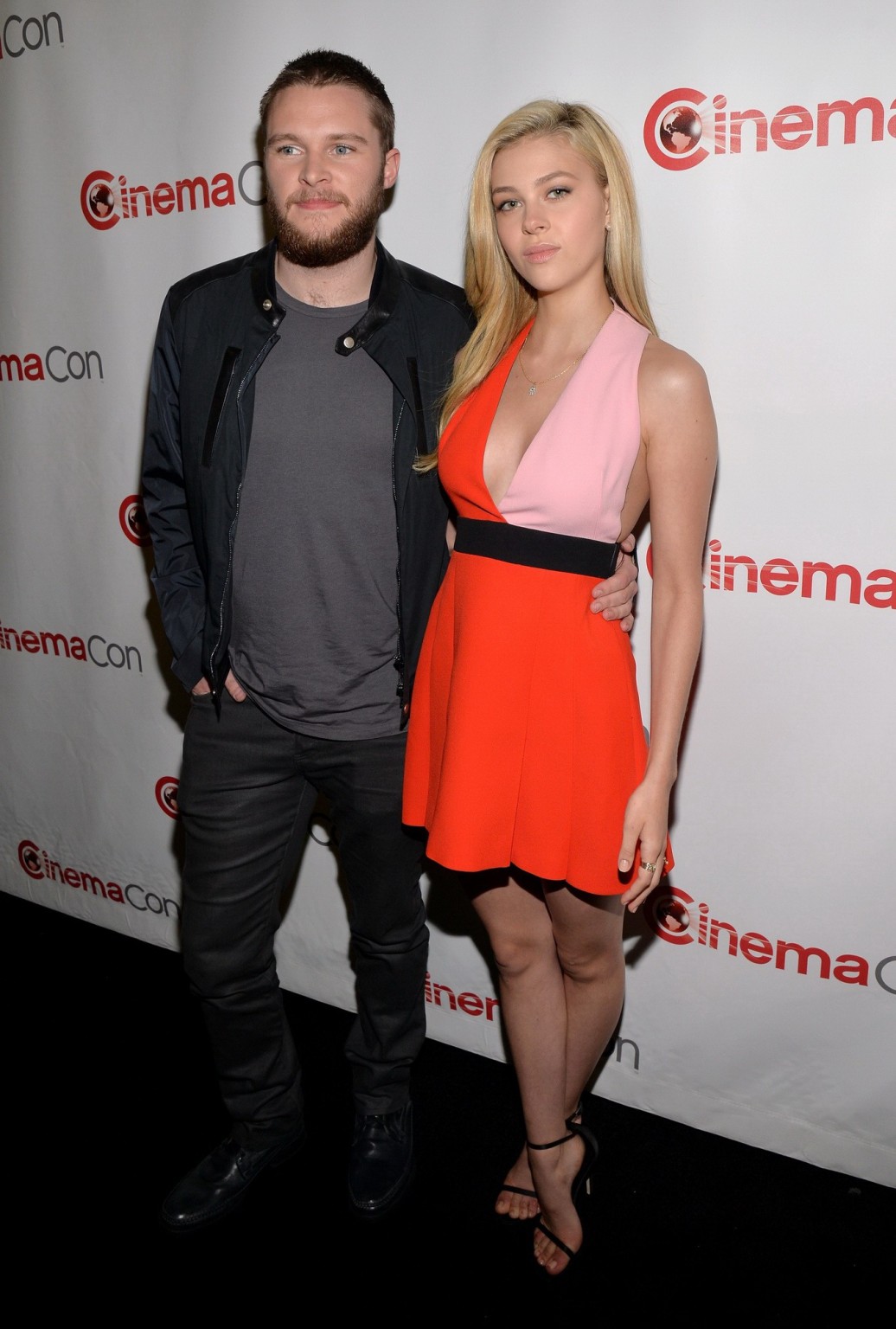 Nicola Peltz braless wearing low cut mini dress at the 2014 Cinemacon Paramount  #75201075