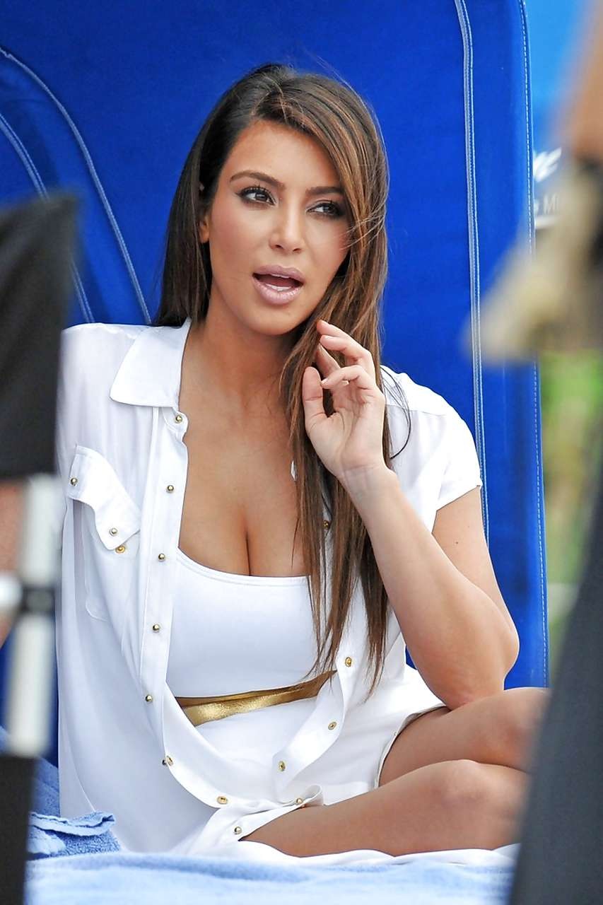 Kim Kardashian exposing huge boobs in swimsuit on beach #75252151