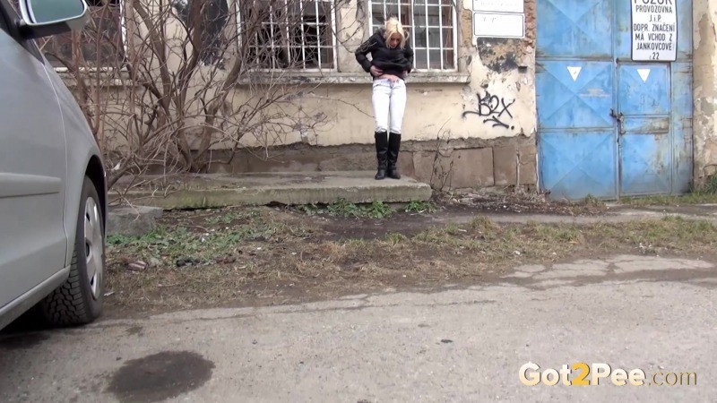 Pretty blonde girl is filmed peeing in public #67500310