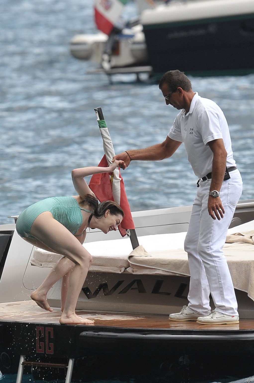 Anne Hathaway shows pokies wearing skimpy wet swimsuit in Italy #75294921
