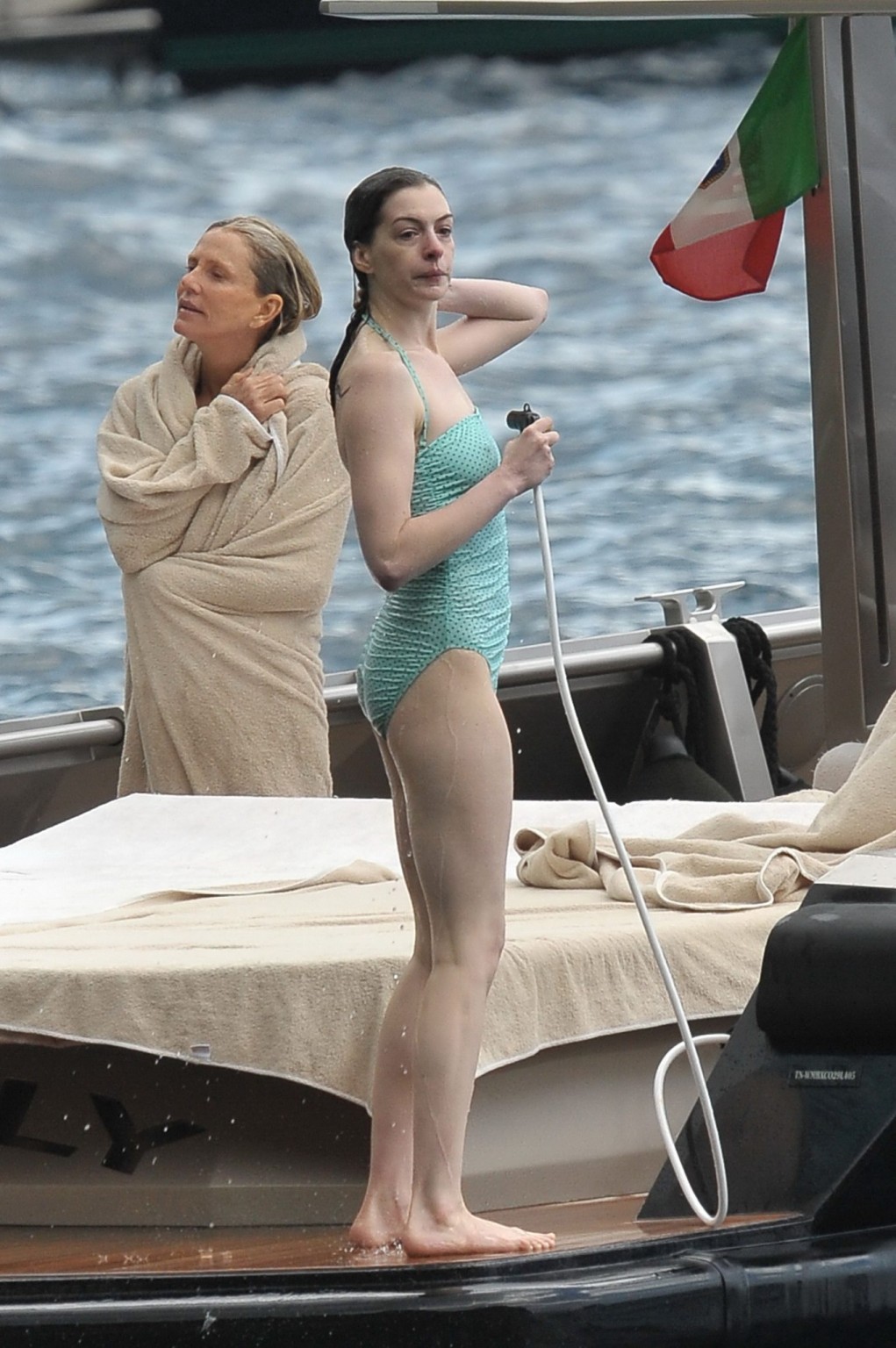 Anne Hathaway shows pokies wearing skimpy wet swimsuit in Italy #75294974