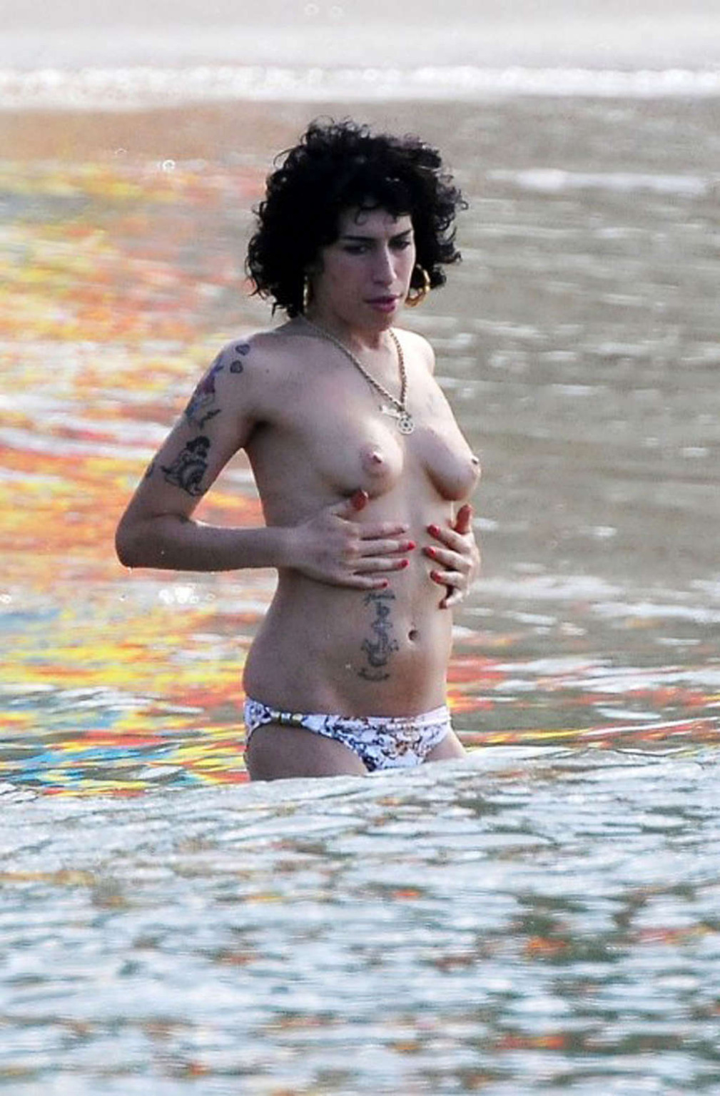 Amy Winehouse enjoying in topless on beach and showing huge boobs #75357829