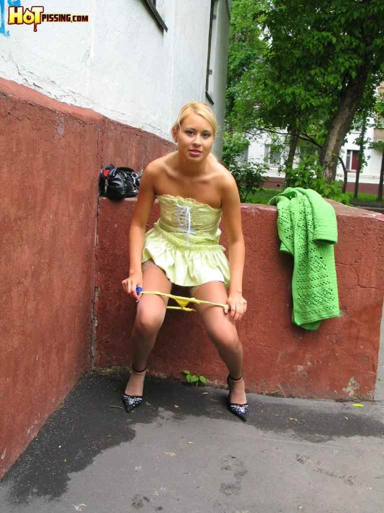 Cute blonde pissing outdoors #76567109