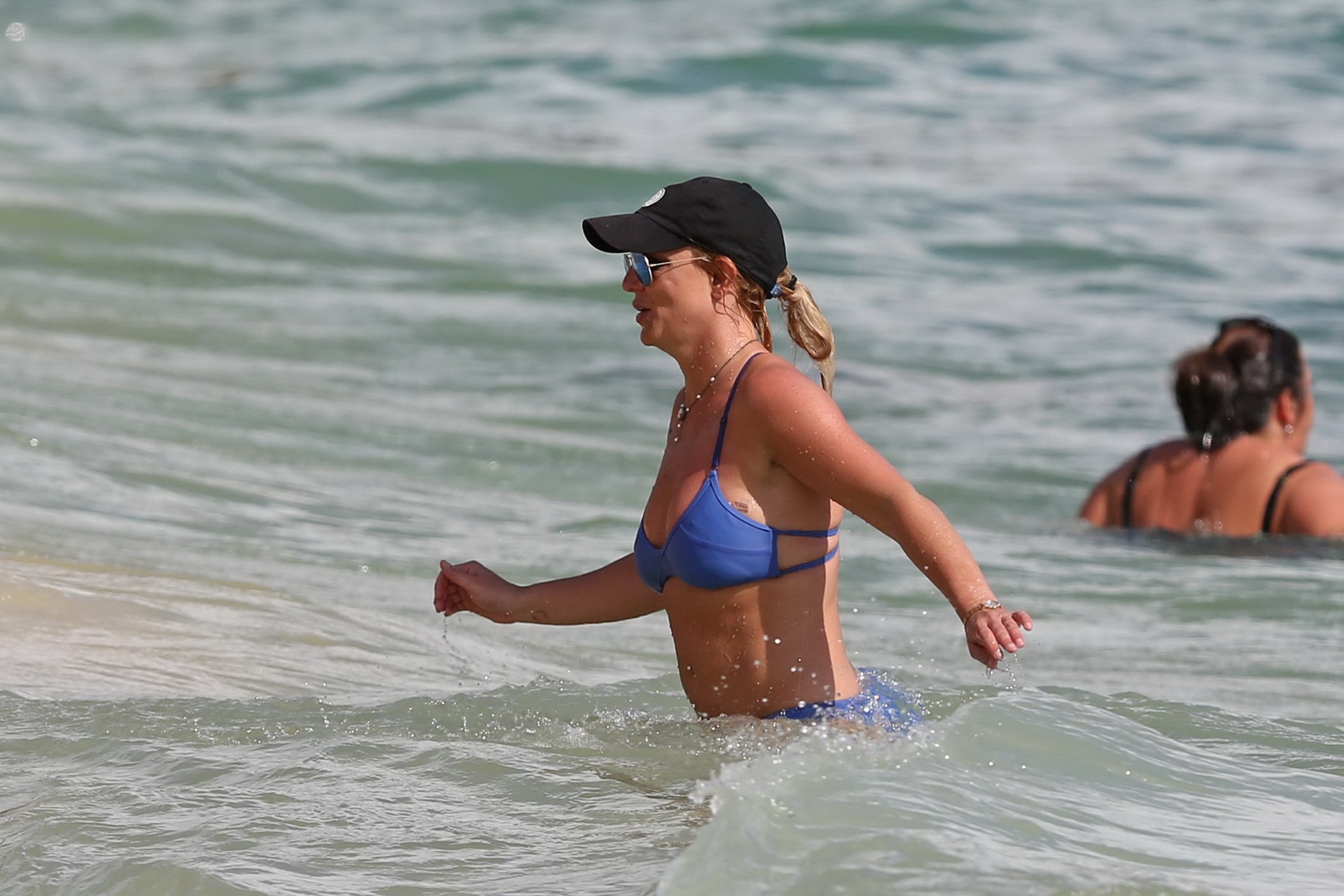 Britney Spears booty wearing skimpy blue bikini at the beach in Hawaii #75168943