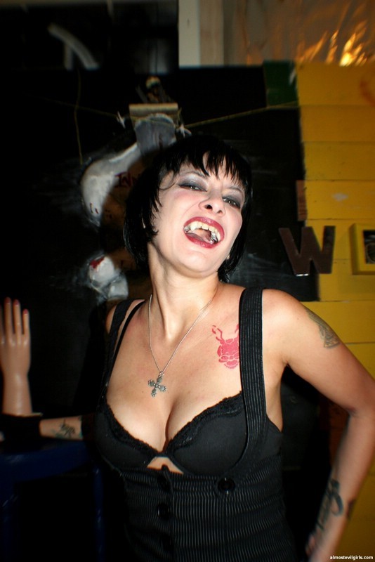 Tattooed Vampire babe gets naked #76404057