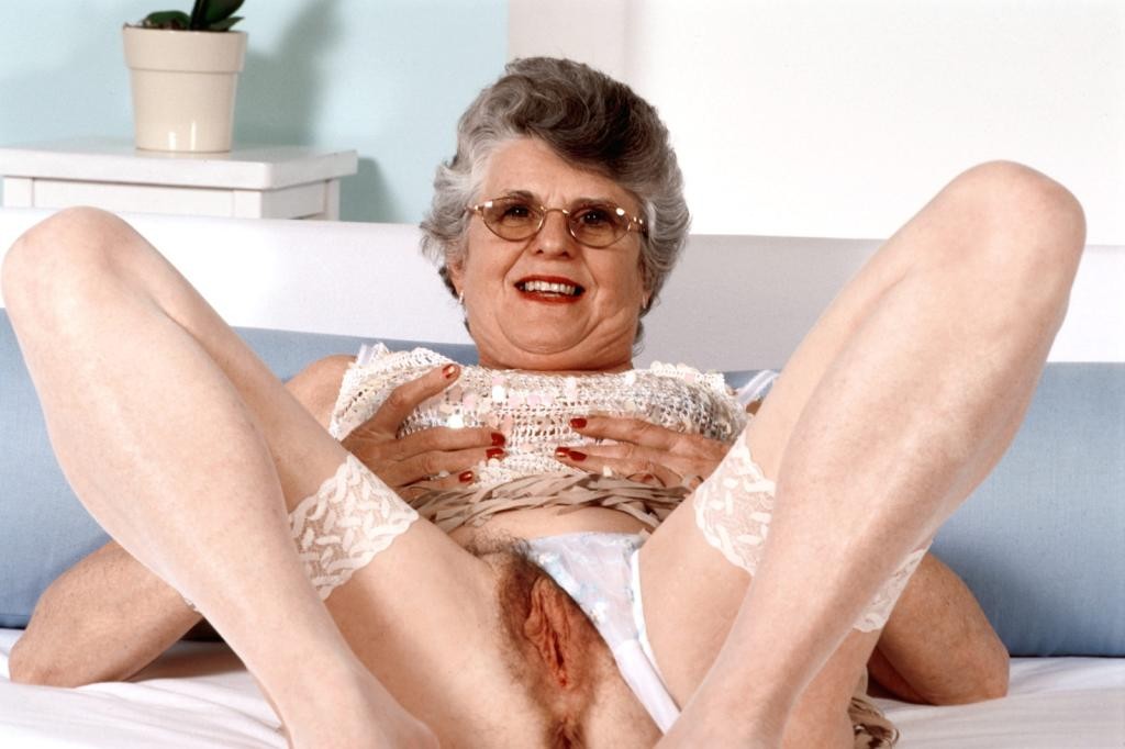 Horny granny in stockings spreading her hairy pussy #77253804