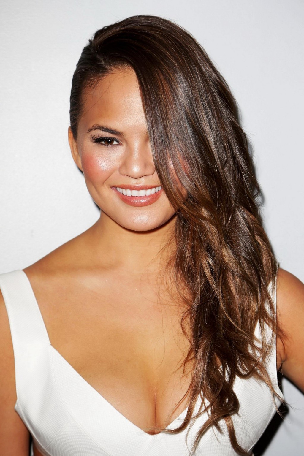 Chrissy Teigen showing huge cleavage at the Beach Bunny fashion show in Miami #75223893