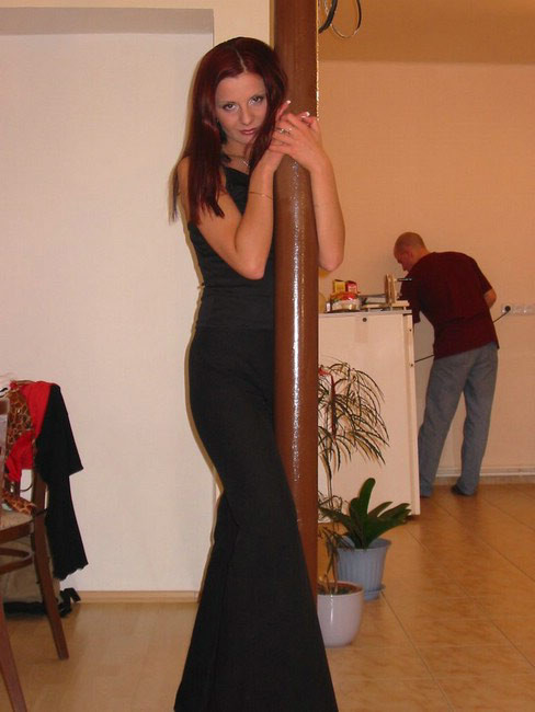 Brunette plays with pole #75079037