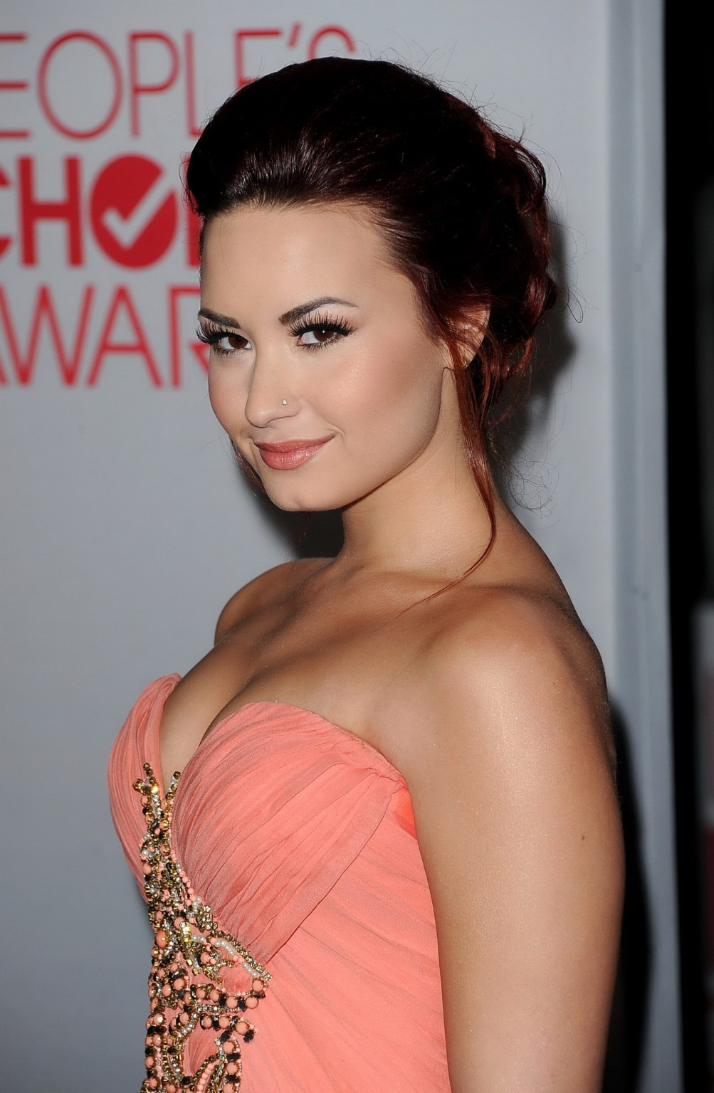 Demi Lovato shows cleavage wearing strapless dress at 2012 People's Choice Award #75276490