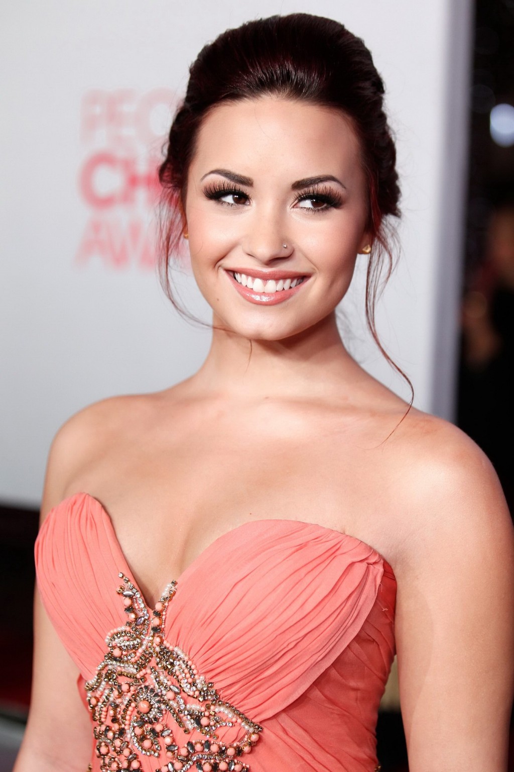 Demi Lovato shows cleavage wearing strapless dress at 2012 People's Choice Award #75276498