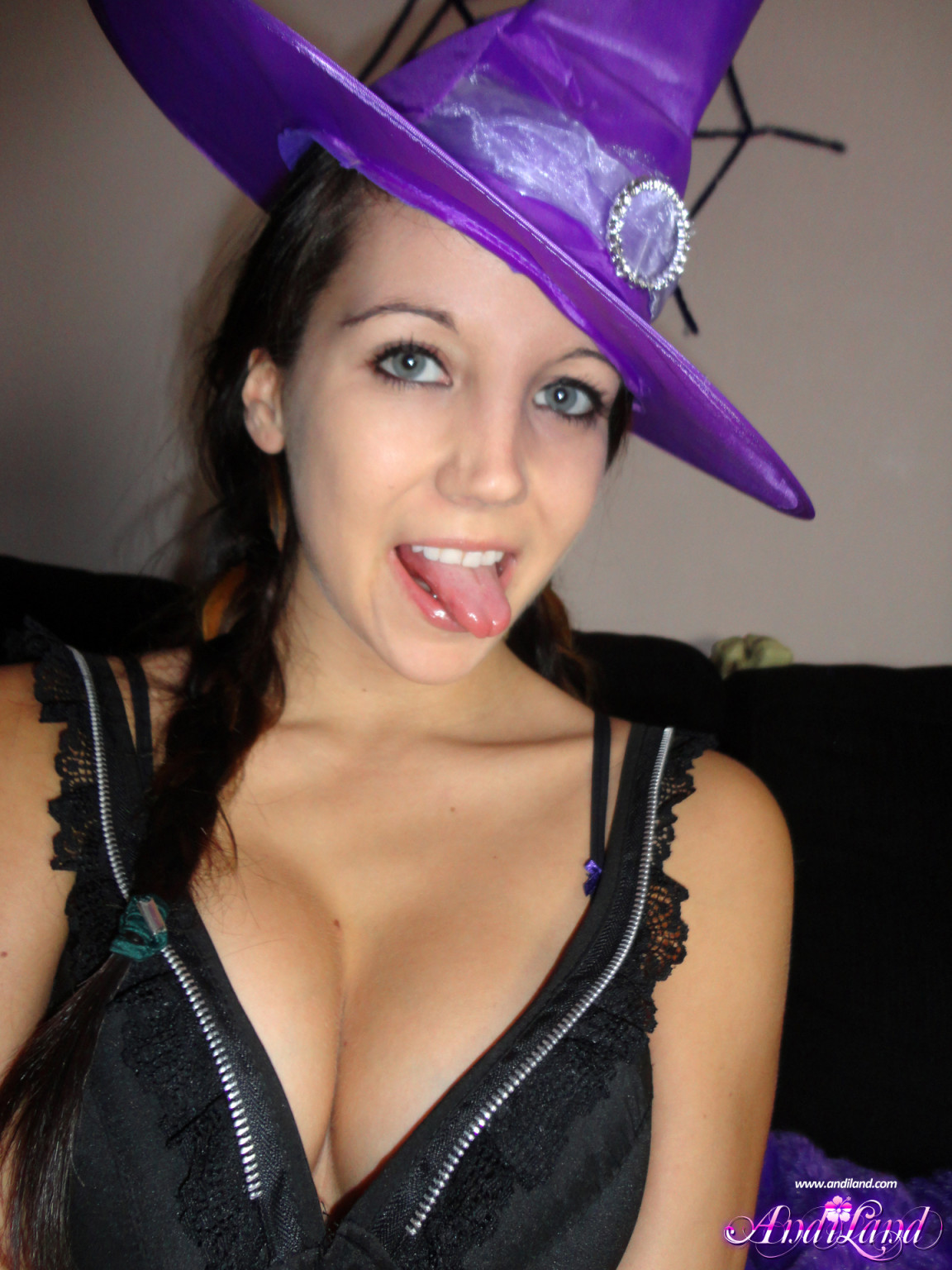 Cute teen girl in witch costume #67413005