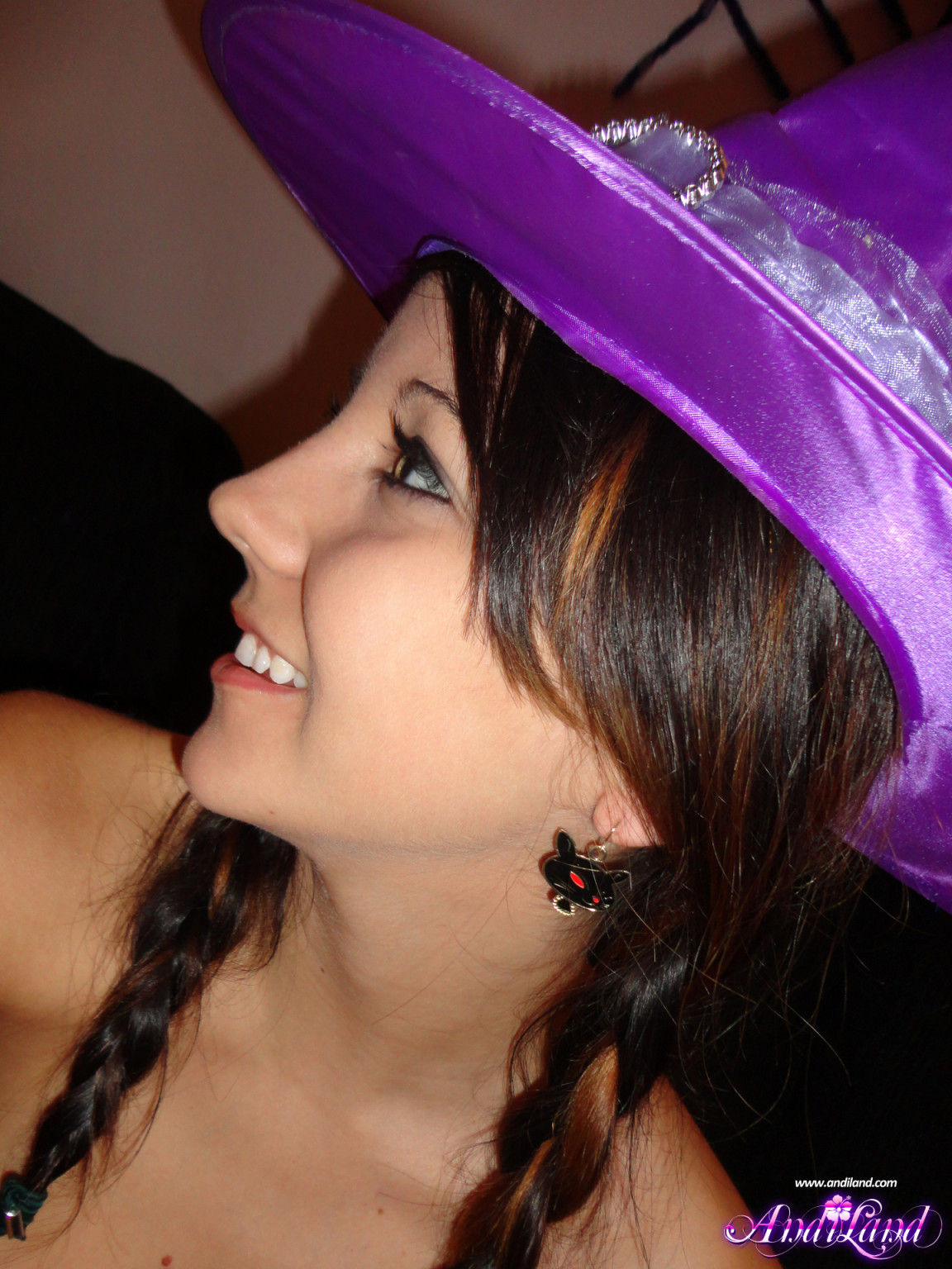 Cute teen girl in witch costume #67413051