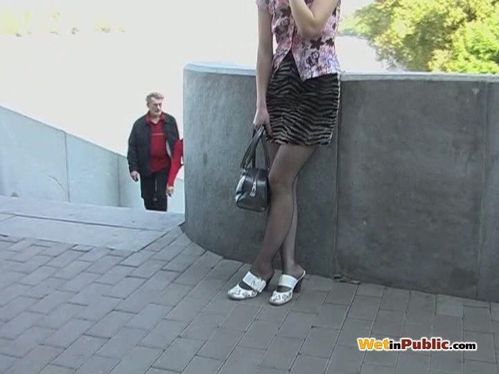 Foxy pissed her black fishnet pantyhose and striped mini in the street #73246923