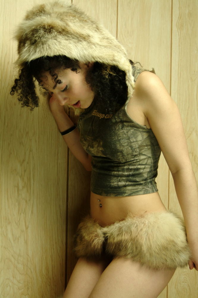 Fetish queen Kinky Zee posing in a fur skirt #74898052